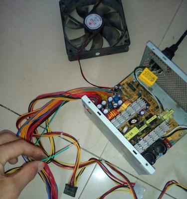 电脑外部电源鼓包如何处理？是否需要更换电源？